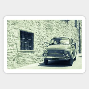 Fiat Bambina in back street Gubbio, medieval town. Sticker